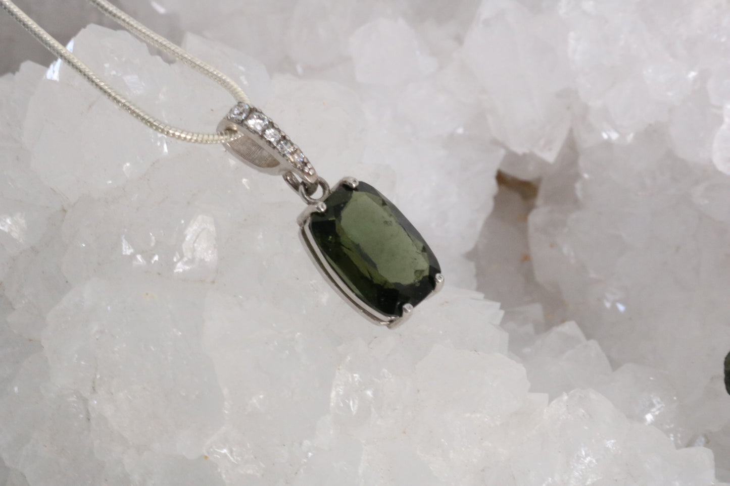 FACETED MOLDAVITE PENDANT