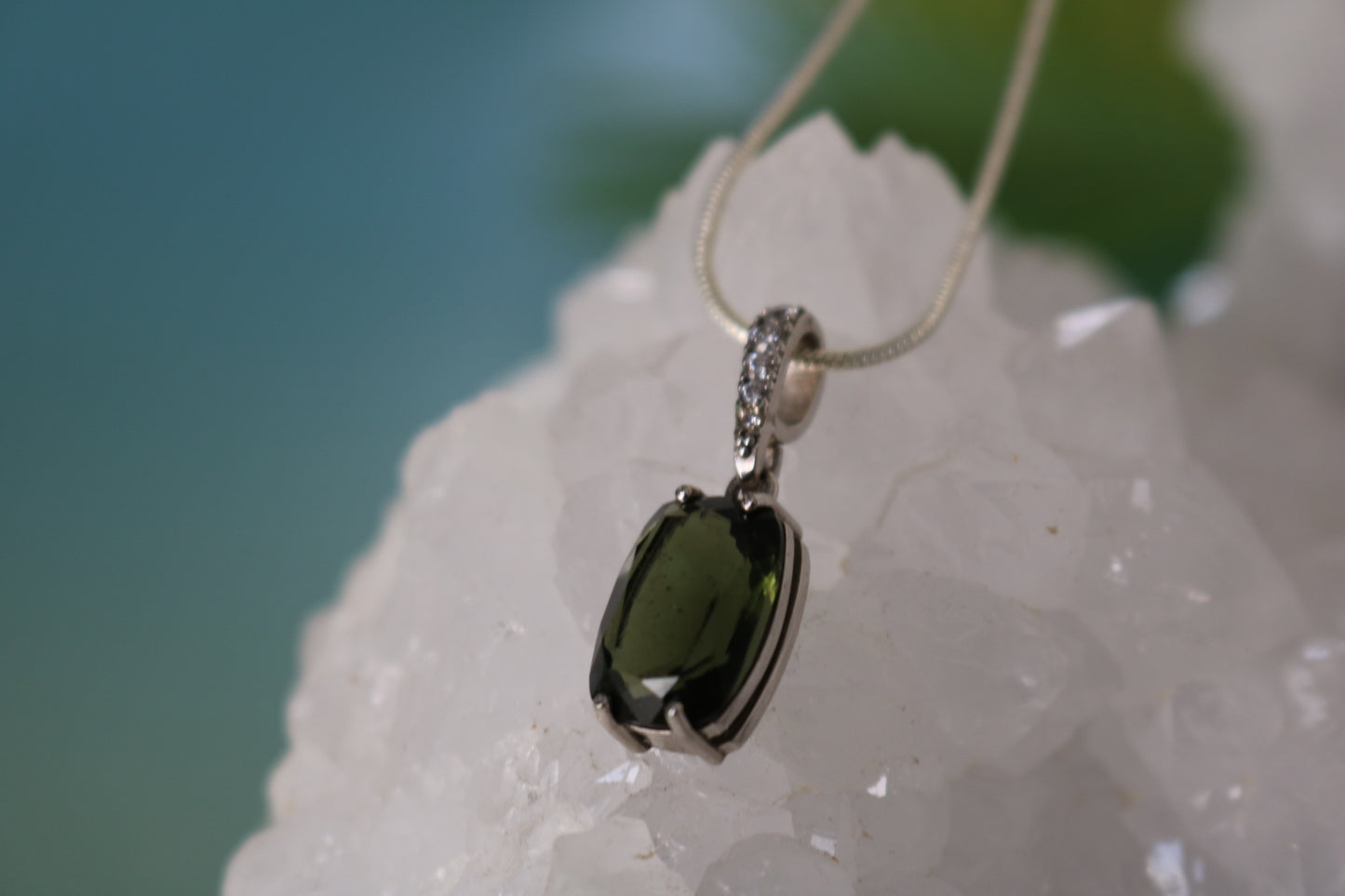 FACETED MOLDAVITE PENDANT