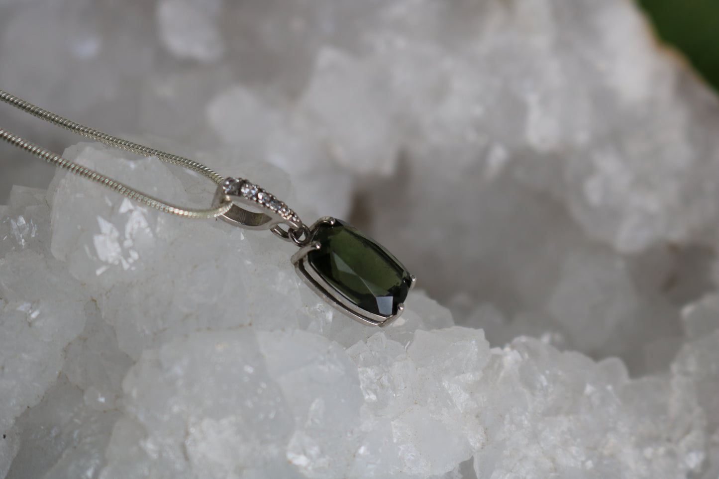 FACETED MOLDAVITE PENDANT