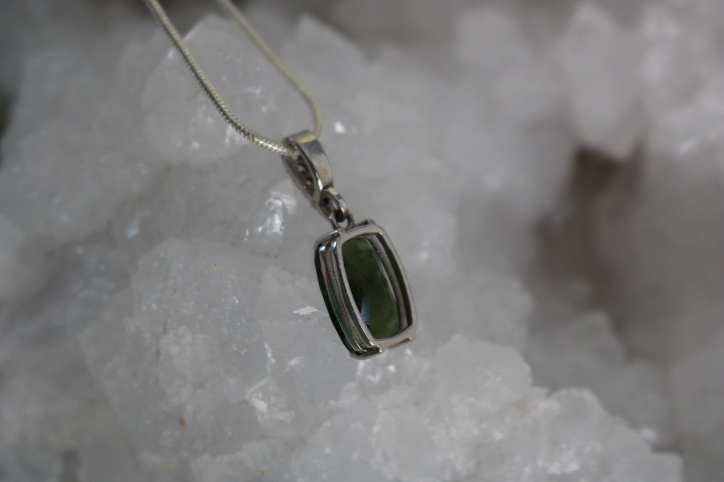 FACETED MOLDAVITE PENDANT